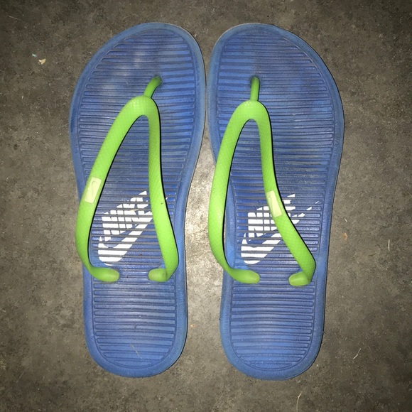 green nike flip flops